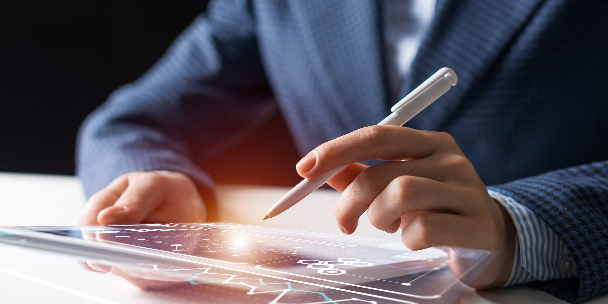 Businessman hands using tablet computer